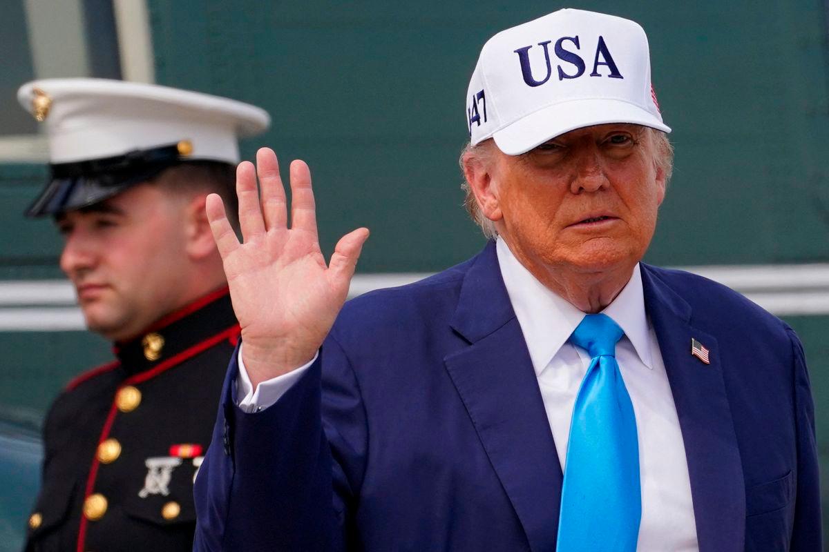 U.S. President Donald Trump waves after disembarking Marine One at Joint Base Andrews, Maryland, U.S., June 6, 2025. REUTERS