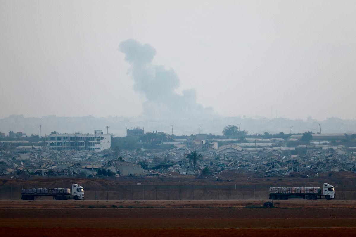 Trucks loaded with aid drive on the Israel-Gaza border as they make their way into Gaza, as seen from Israel, June 7, 2025. REUTERSpix