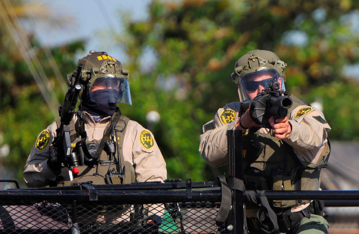 Members of law enforcement operate amidst a standoff between police and protesters following multiple detentions by Immigration and Customs Enforcement (ICE), in the Los Angeles County city of Paramount, California, U.S., June 7, 2025. REUTERSpix