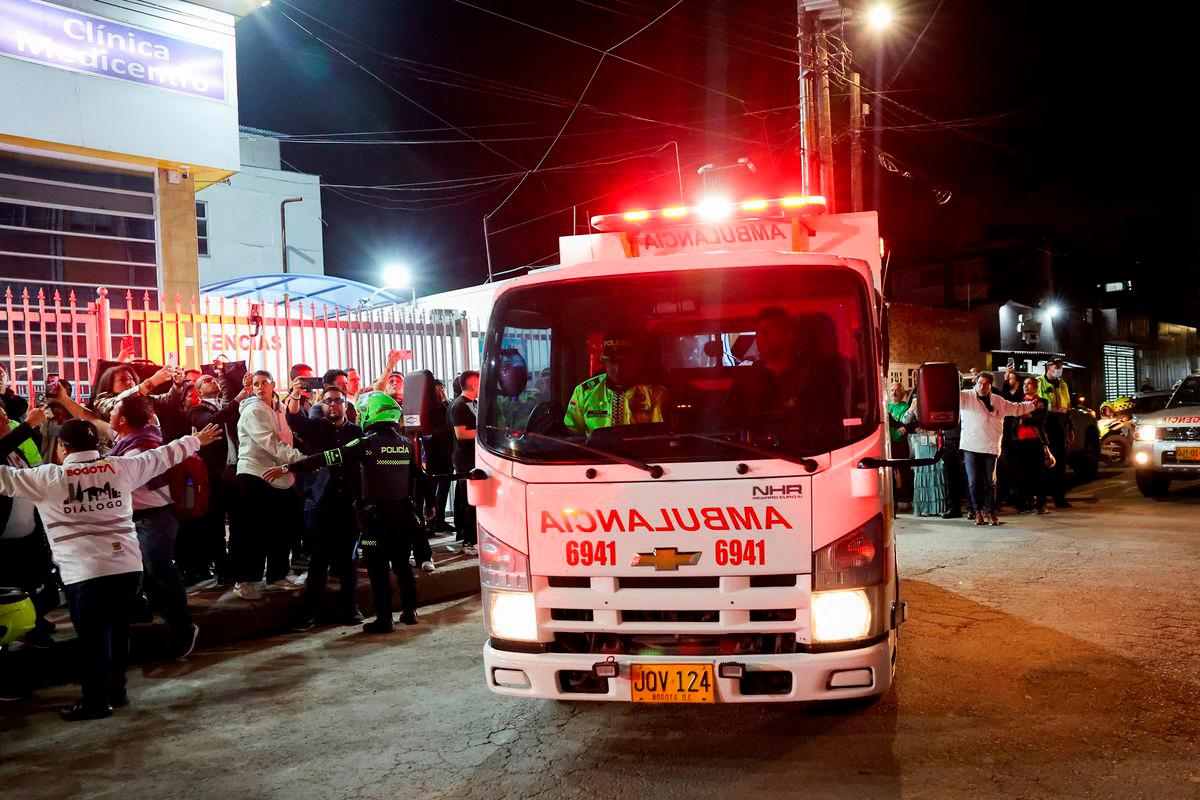 An ambulance in which Colombian Senator Miguel Uribe Turbay of the opposition Democratic Center party is transported to another hospital, after he was shot during a campaign event, leaves a hospital, in Bogota, Colombia, June 7, 2025. REUTERS