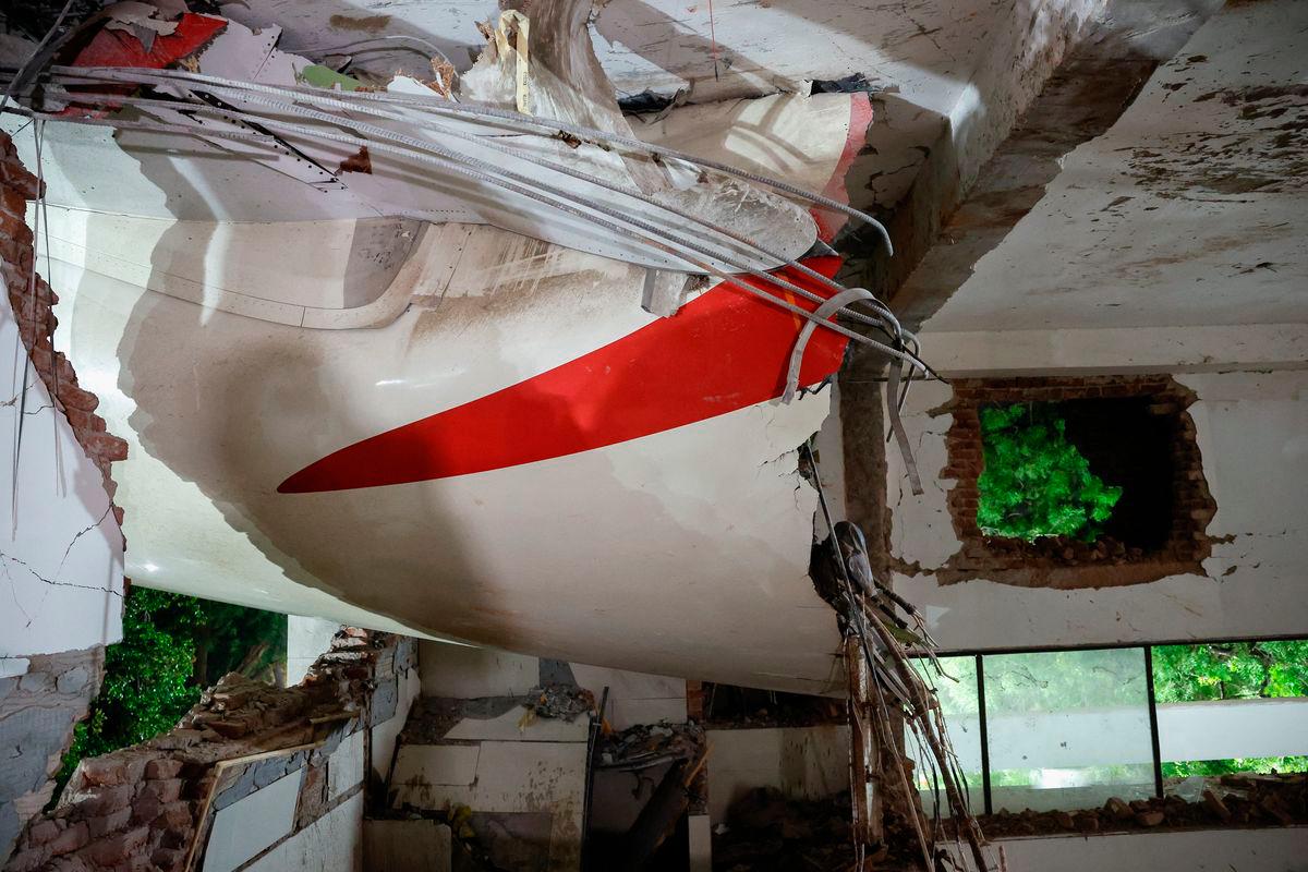A view shows debris at the crash site after an Air India aircraft - REUTERSPIX