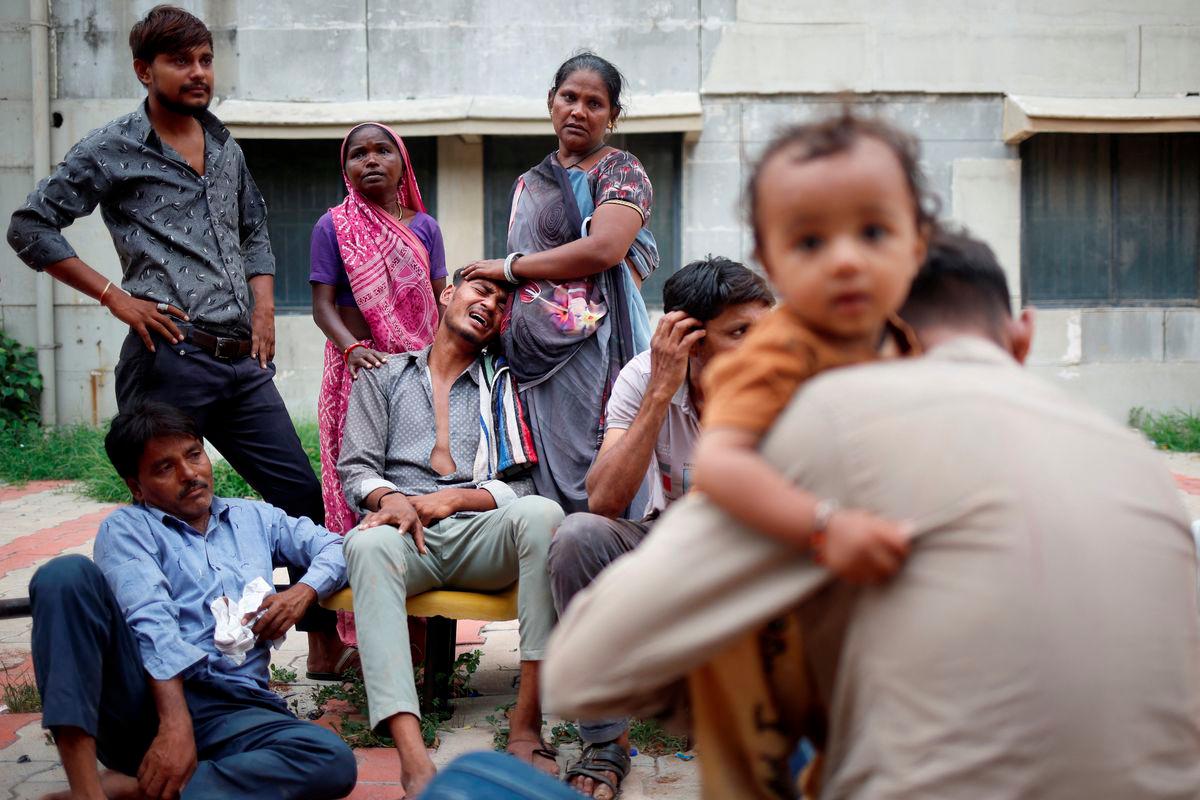 Kalpeshbhqi Patni, 28, mourns as he sits outside the postmortem room at a hospital, for his brother Akash Patni, 14, who died when an Air India Boeing 787-8 Dreamliner plane crashed during take-off from an airport, in Ahmedabad, India, June 13, 2025. - REUTERSPIX