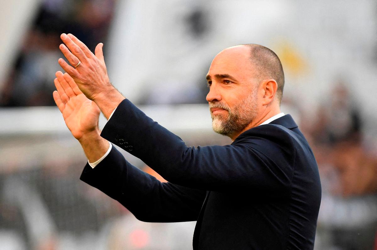 Juventus coach Igor Tudor applauds fans before the match REUTERS