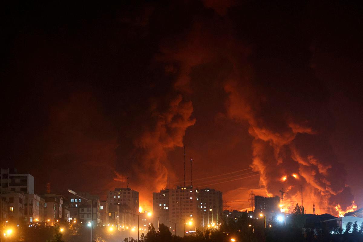 Fire of Israeli attack on Sharan Oil depot is seen following the Israeli strikes on Iran, in Tehran, Iran, June 15, 2025. Majid Asgaripour/WANA (West Asia News Agency) via REUTERS