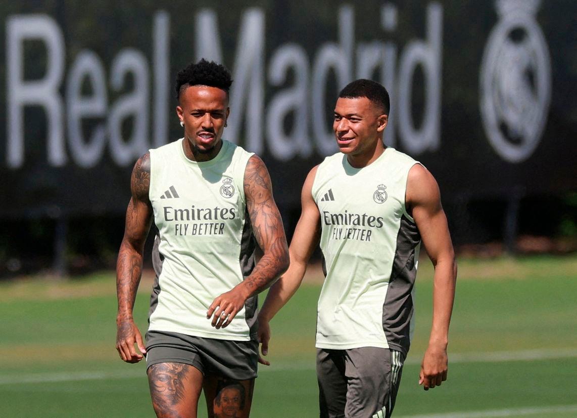 Real Madrid’s Eder Militao and Kylian Mbappe during training REUTERS/Hannah Mckay/File Photo