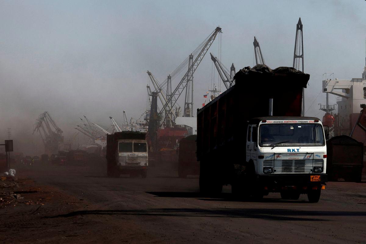 Trucks loaded with coal drive to the coal yard at the Deendayal Port in Kandla, in the western state of Gujarat, India, April 5, 2025. - REUTERSPIX