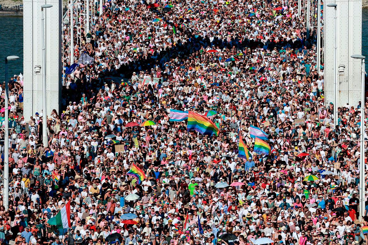 People cross Elisabeth Bridge during the Budapest Pride March in Budapest, Hungary, June 28, 2025. REUTERS/Bernadett Szabo