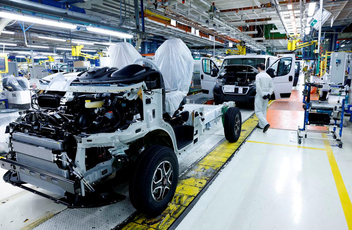 FILE PHOTO: Staff members work at the assembly line of Stellantis’ Sevel van-making plant in Atessa, Italy, January 23, 2024. REUTERS/Remo Casilli/File Photo