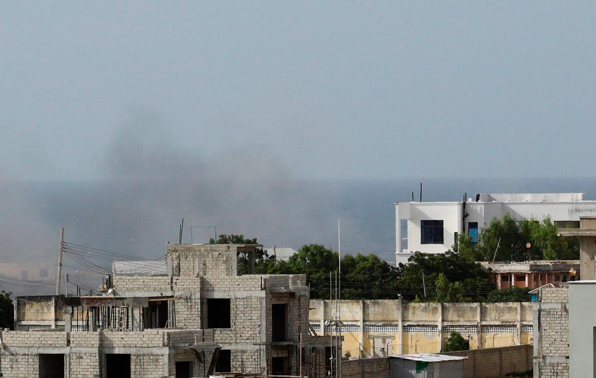Smoke rises in the direction of Aden Adde airport, following an African Union helicopter crash, in Mogadishu, Somalia, July 2, 2025. - REUTERS/Feisal Omar