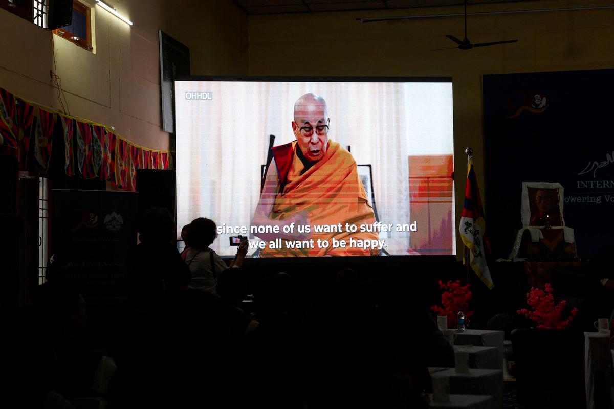 People watch a video message of Tibetan spiritual leader Dalai Lama at the International Tibet Youth Forum at Tibetan Reception Center in the northern hill town of Dharamshala, India, July 3, 2025. - REUTERSPIX