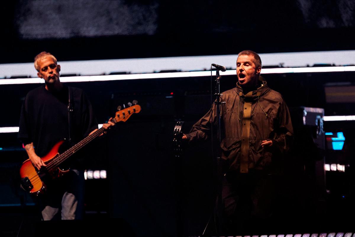 Liam Gallagher and Gem Archer of Oasis perform, during the first of their sellout comeback shows, at the Cardiff Principality Stadium, in Cardiff, Wales, Britain - REUTERSPix
