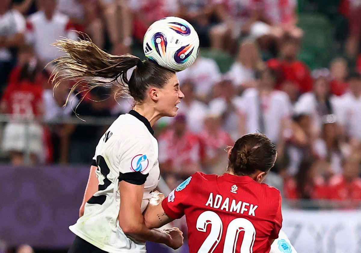 Germany’s Jule Brand in action with Poland’s Kayla Adamek- REUTERS