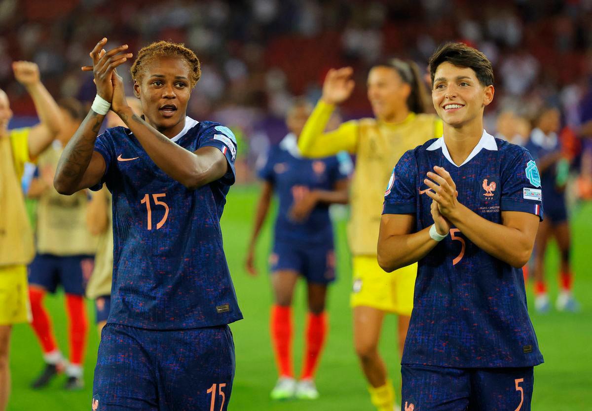 France’s Kelly Gago and Elisa De Almeida celebrate after the match-REUTERS