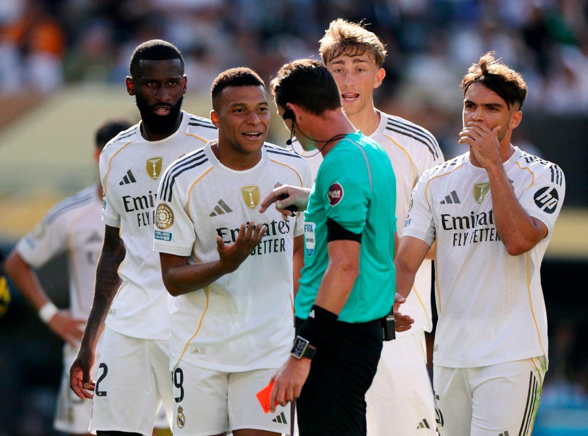Real Madrid’s Kylian Mbappe reacts with referee Ramon Abatti-REUTERS