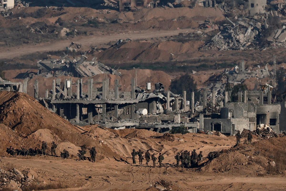 Israeli soldiers operate in Gaza, as seen from the Israeli side of the border, July 6, 2025. - REUTERS/Amir Cohen