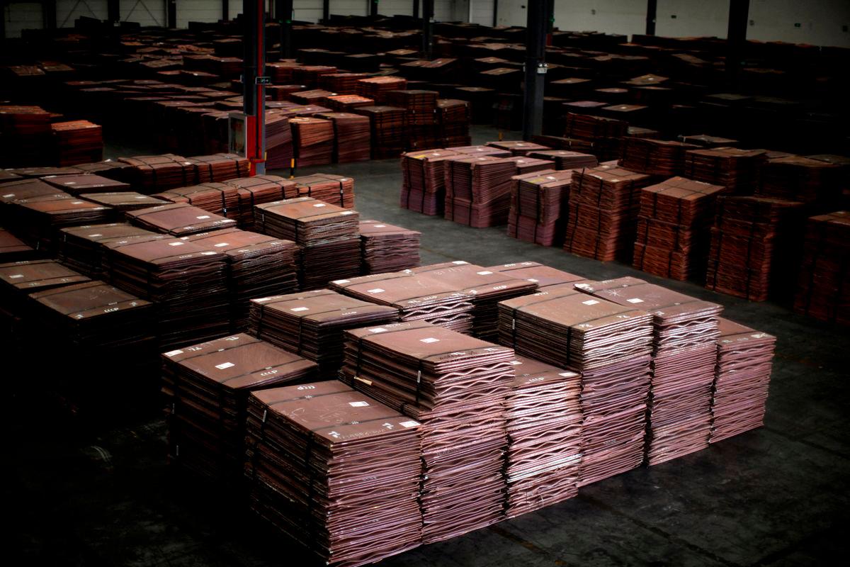 FILE PHOTO: Copper cathodes are seen inside a warehouse near Yangshan Deep Water Port, south of Shanghai March 23, 2012. REUTERS
