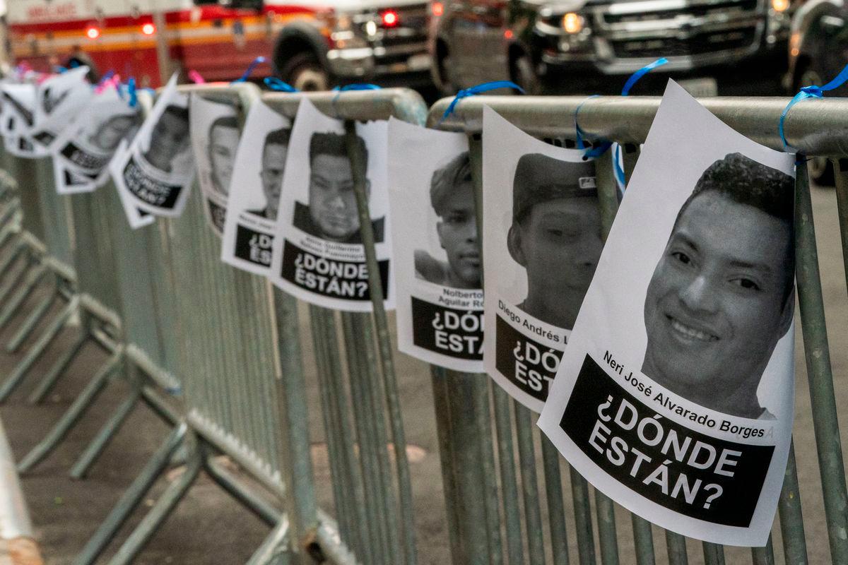Images of people detained by the U.S. Immigration and Customs Enforcement (ICE) are tied to barricades outside a U.S. immigration court in Manhattan, in New York City, U.S., July 10, 2025.