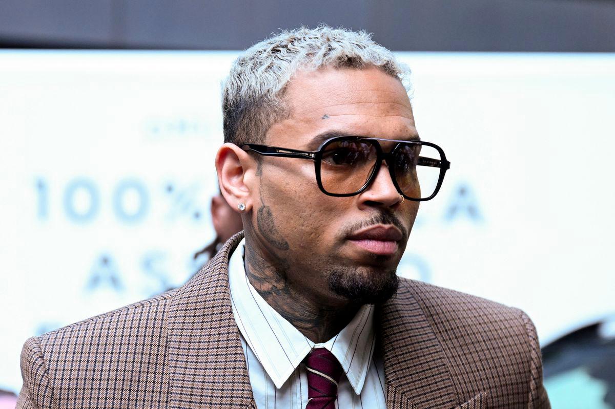 U.S. singer Chris Brown, who has been charged with inflicting grievous bodily harm in what prosecutors said was an unprovoked attack on a music producer at the Tape nightclub in central London in 2023, walks outside the Southwark Crown Court in London, Britain, July 11, 2025. - REUTERSPIX