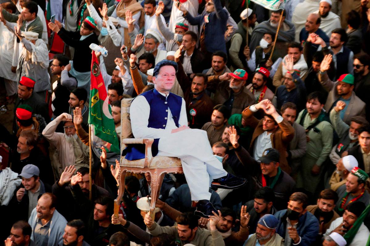 Supporters of the former Pakistani Prime Minister Imran Khan's party, the Pakistan Tehreek-e-Insaf (PTI), carry a cutout of him, as they gather, to protest what they call a black day and a stolen mandate in last year's general election, during a rally in Swabi, Pakistan February 8, 2025. - REUTERSPIX