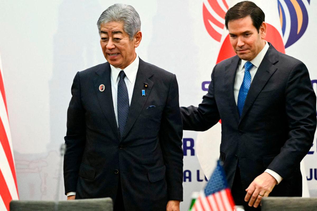 Japan’s Foreign Minister Takeshi Iwaya and US Secretary of State Marco Rubio arrive for a meeting on the sidelines of the ASEAN Foreign Ministers’ Meeting at the Kuala Lumpur Convention Centre in Kuala Lumpur, Malaysia July 11, 2025. MANDEL NGAN/Pool via REUTERS