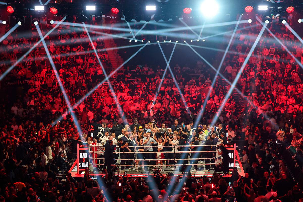 Amanda Serrano (right) and Katie Taylor (left) gesture to fans after their undisputed super lightweight championship boxing bout at Madison Square Garden. Credit: Vincent Carchietta-Imagn Images - REUTERS
