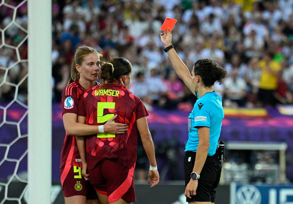 Germany’s Carlotta Wamser is shown a red card by referee Silvia Gasperotti REUTERS