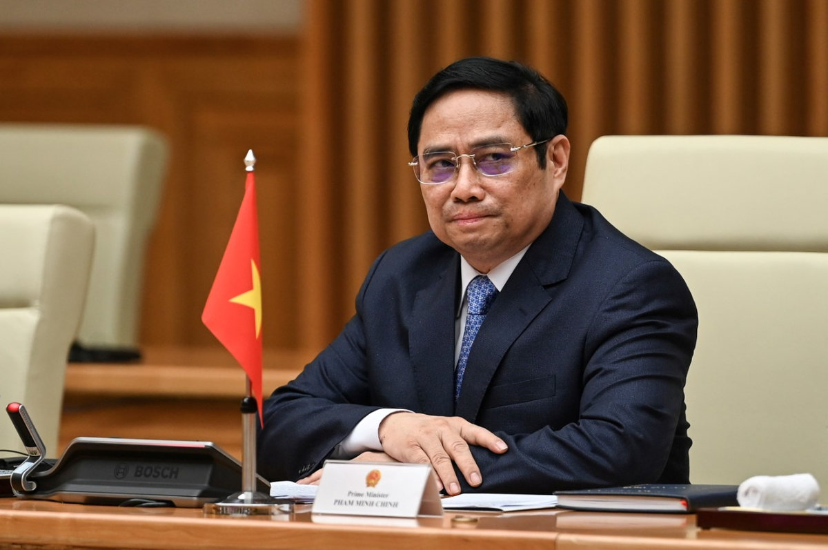 Vietnam’s Prime Minister Pham Minh Chinh attends a meeting with then U.S. Vice President Kamala Harris at the Government office in Hanoi, Vietnam, August 25, 2021. - REUTERS