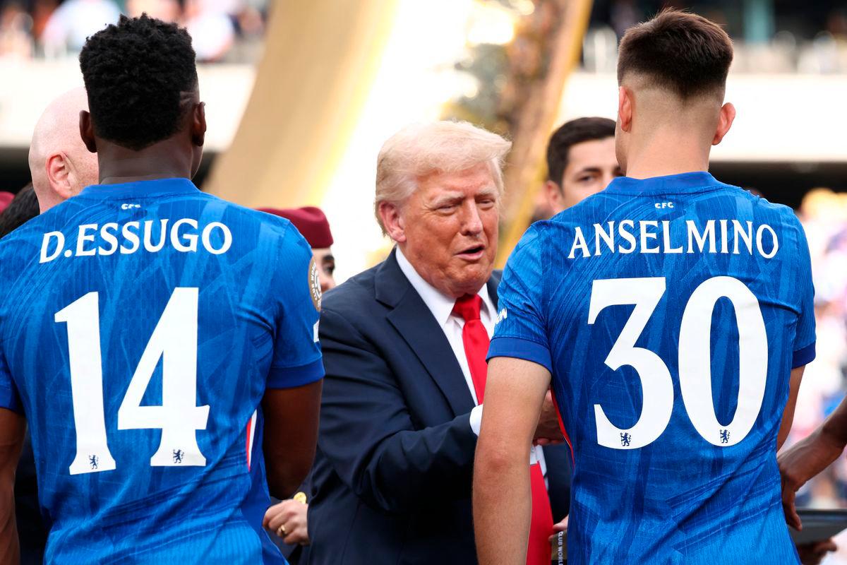 U.S. President Donald Trump presents Chelsea’s Aaron Anselmino with a medal after Chelsea won against Paris St Germain in the FIFA Club World Cup final, at the MetLife Stadium in East Rutherford, New Jersey, U.S., July 13, 2025- REUTERS