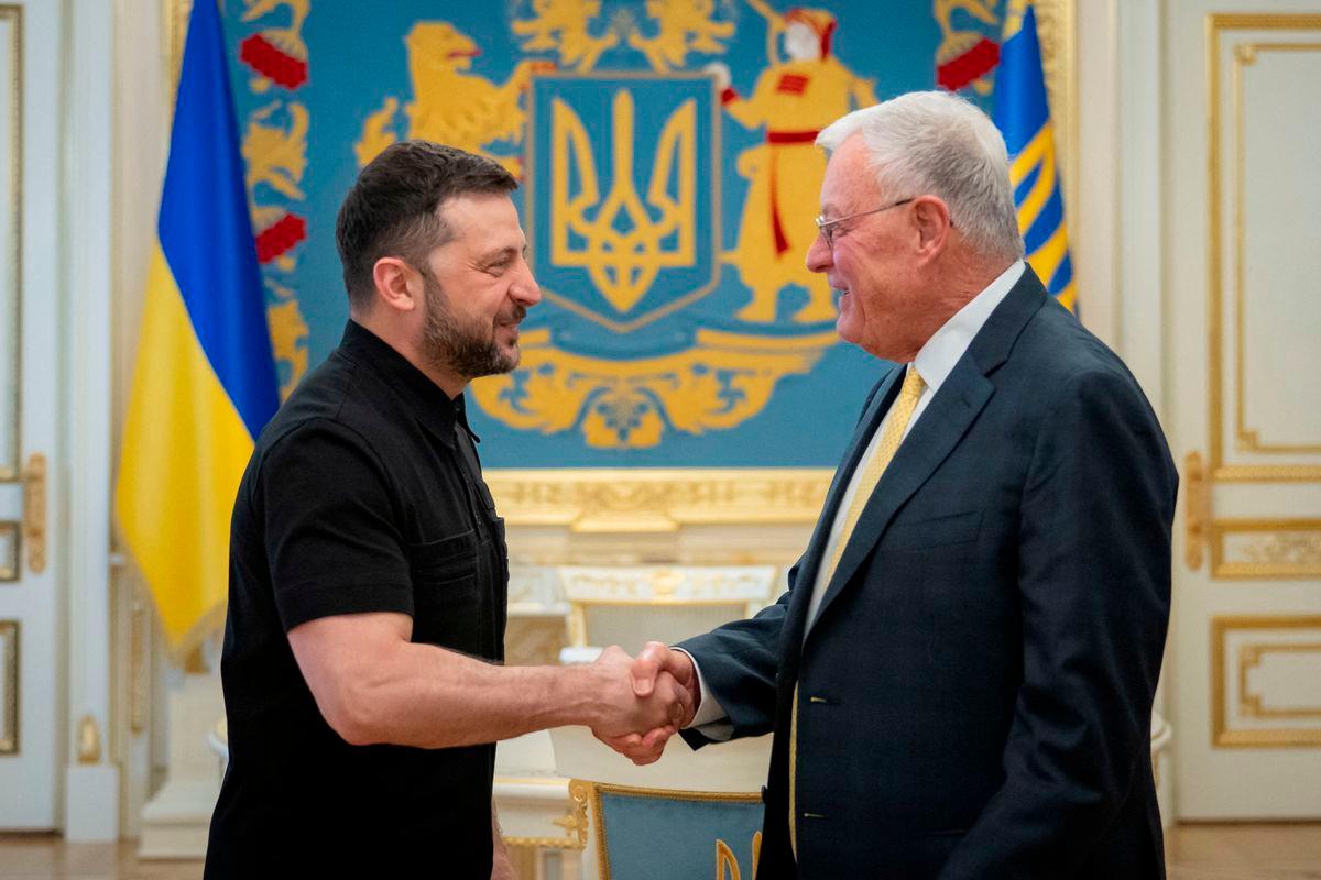 Ukraine’s President Volodymyr Zelenskiy shakes hands with U.S. Special Envoy for Ukraine Keith Kellogg. Credit: Ukrainian Presidential Press Service/Handout via REUTERS
