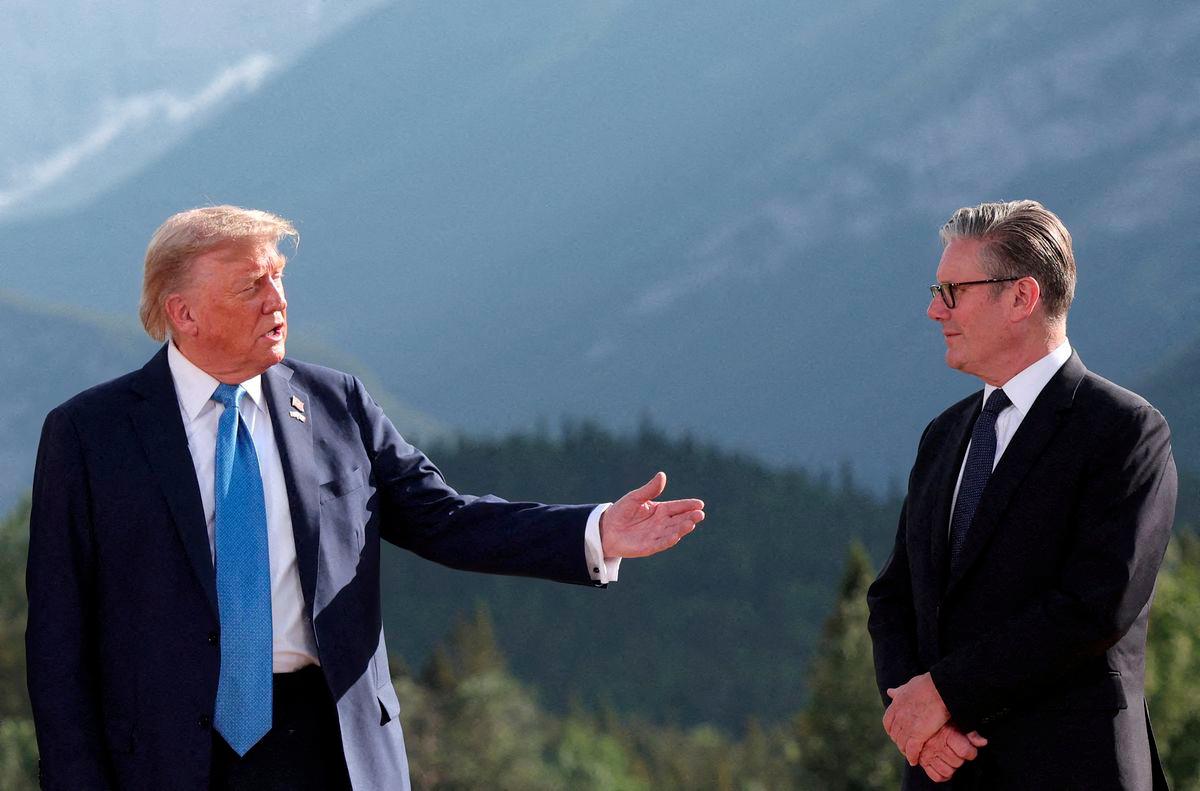 U.S. President Donald Trump and British Prime Minister Keir Starmer attend a photo session during the G7 Summit, in Kananaskis, Alberta, Canada, June 16, 2025. - REUTERSPIX