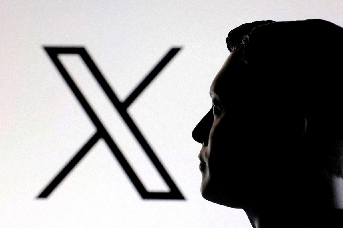 FILE PHOTO: A 3D-printed miniature model of Elon Musk and the X logo are seen in this illustration taken January 23, 2025. REUTERS