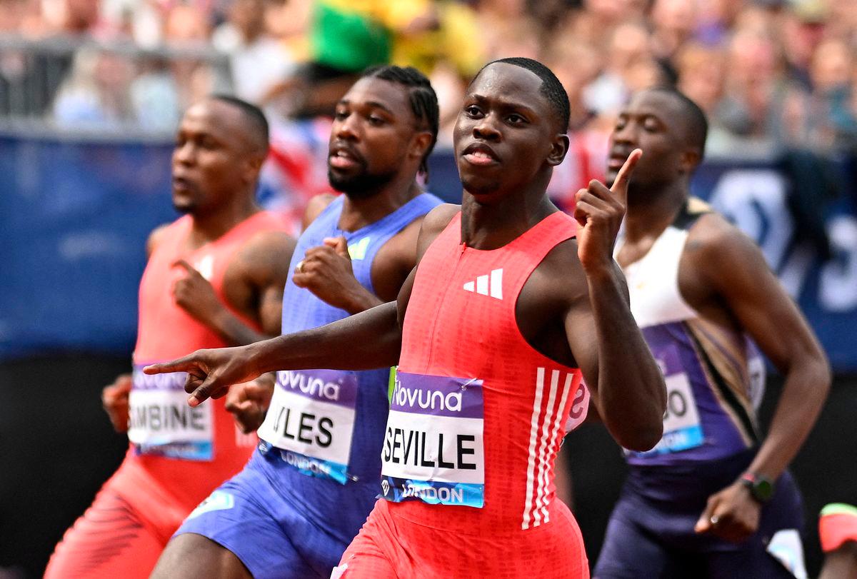 Jamaica’s Oblique Seville celebrates after winning the Men’s 100m final ahead of Noah Lyles of the U.S. REUTERS/Dylan Martinez TPX IMAGES OF THE DAY