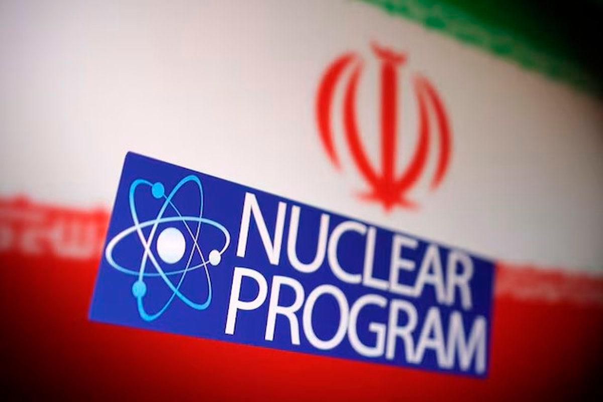 Iranian flag, atom symbol and words “Nuclear program” are in this illustration taken June 16, 2025. - REUTERS