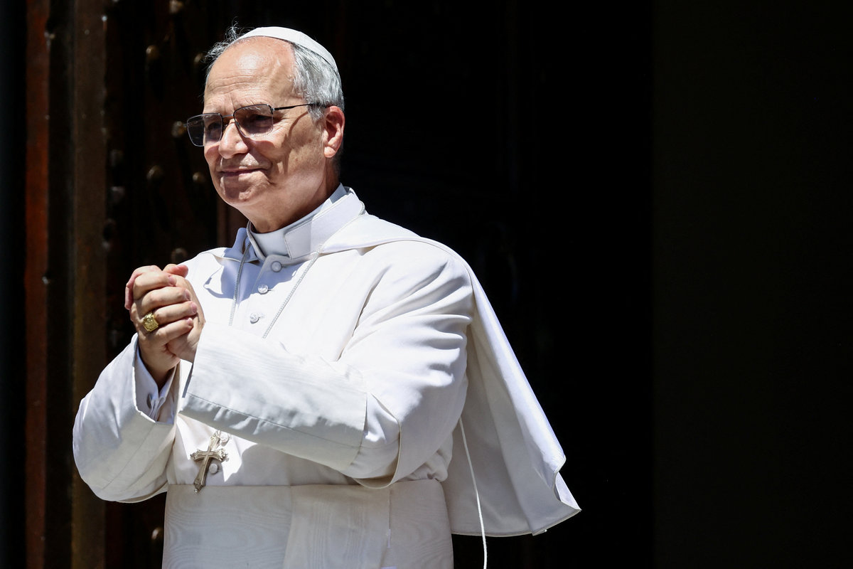 Pope Leo XIV greets people at the end of the Angelus prayer in Castel Gandolfo, Italy, July 20, 2025. - REUTERS