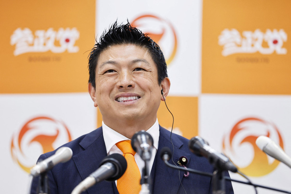 Japan’s opposition Sanseito party leader Sohei Kamiya smiles as he speaks to the members of the media, on the day of the upper house election, at the party's election operation center in Tokyo, Japan July 20, 2025, in this photo taken by Kyodo. - Kyodo/via REUTERS