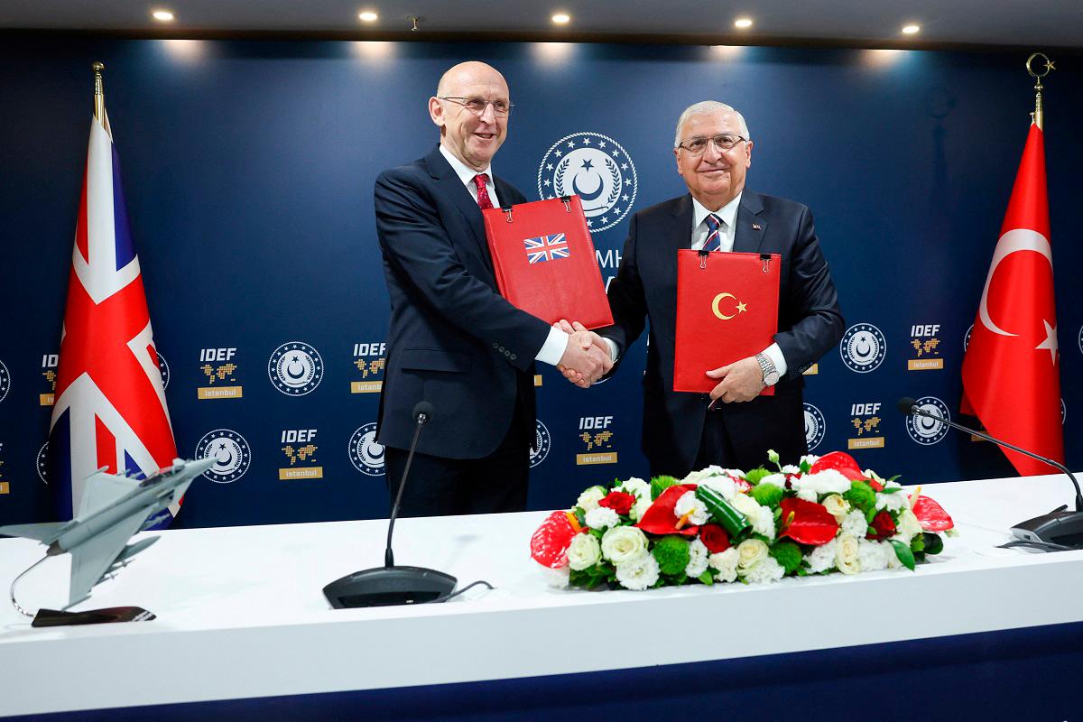 Turkish Defence Minister Yasar Guler and British Defence Secretary John Healey attend a signing ceremony on the sidelines of the International Defence Industry Fair (IDEF) in Istanbul, Turkey, July 23, 2025. - REUTERS/Dilara Senkaya
