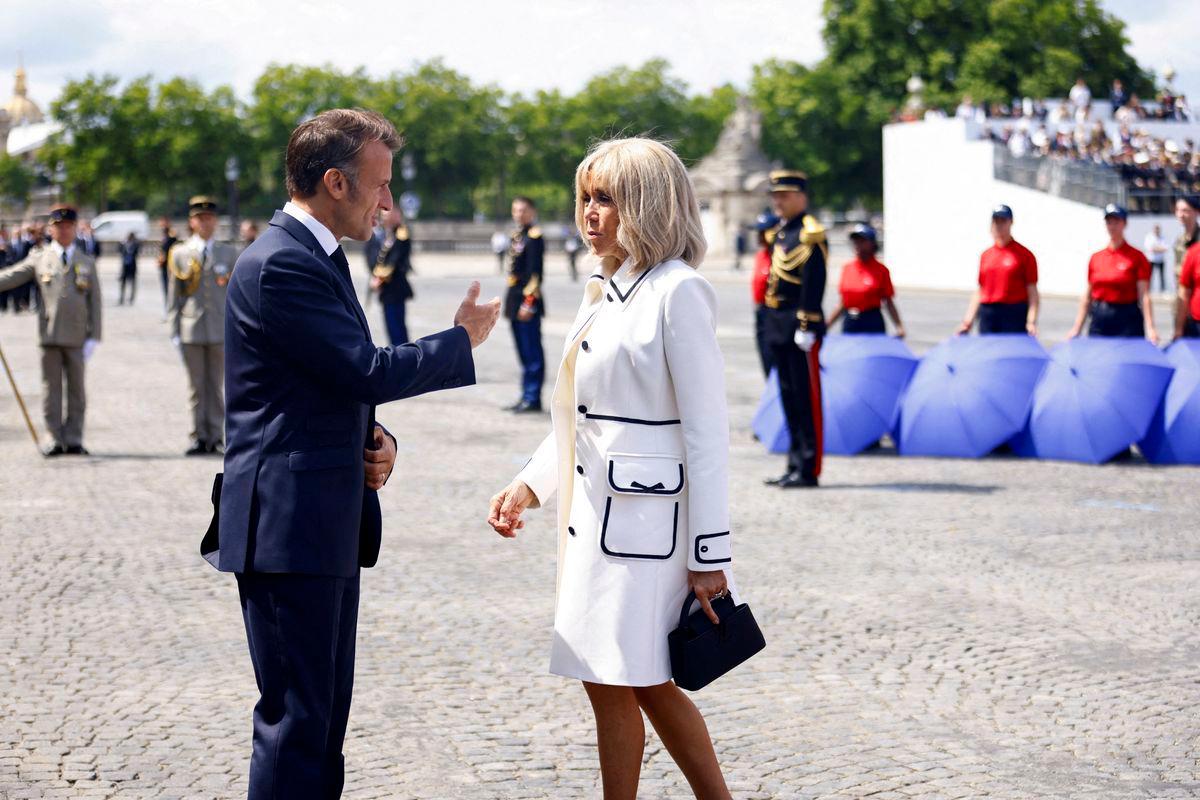 French President Emmanuel Macron and his wife Brigitte - Mohammed Badra/Pool via REUTERS/File Photo