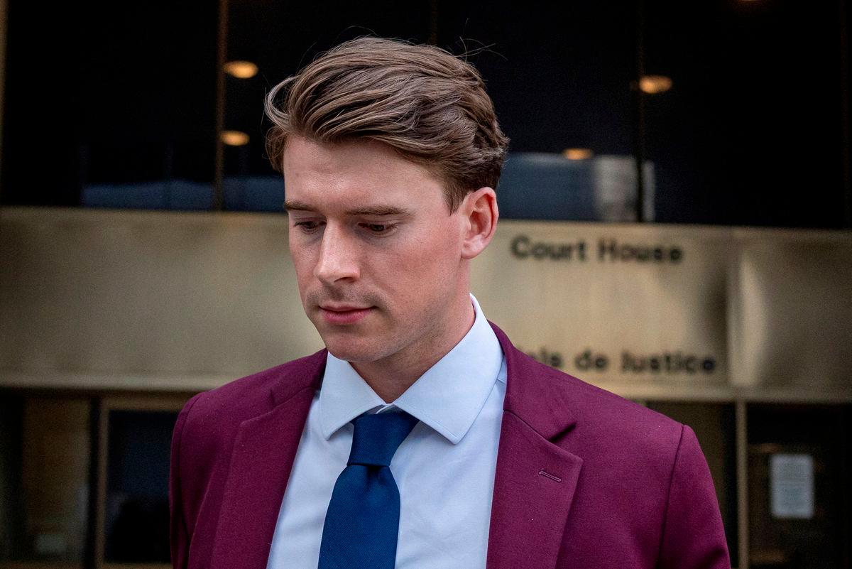 Carter Hart leaves court after a judge found him and his teammates not guilty in the trial involving players from Canada’s 2018 gold medal–winning world junior hockey team, who were charged with sexually assaulting a woman in a hotel room, at the Superior Court of Justice in London, Ontario, Canada, July 24, 2025- REUTERS/Carlos Osorio TPX IMAGES OF THE DAY