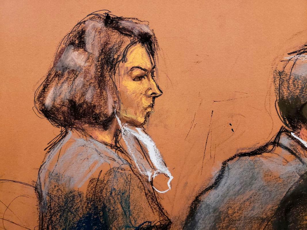 Jeffrey Epstein associate Ghislaine Maxwell sits at the defense table as juror number 50 answers questions from Judge Alison Nathan about his answers on the juror questionaire in a courtroom sketch in New York City, U.S., March 8, 2022. - Reuterspix