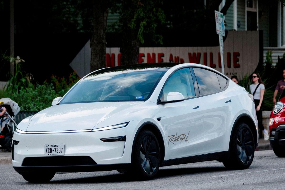 A Tesla robotaxi drives on the street along South Congress Avenue in Austin, Texas, U.S., June 22, 2025. - REUTERSPIX