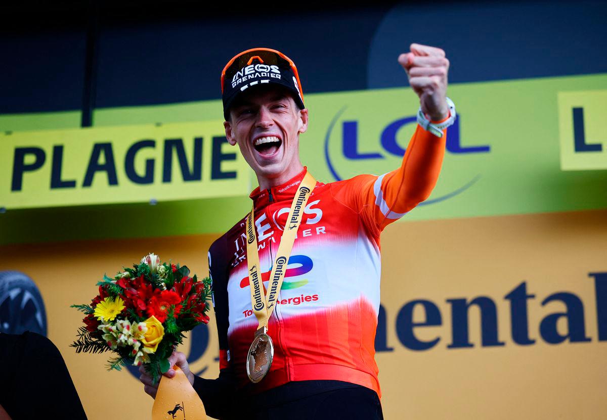 Ineos Grenadiers’ Thymen Arensman celebrates on the podium after winning stage 19 -REUTERSpix