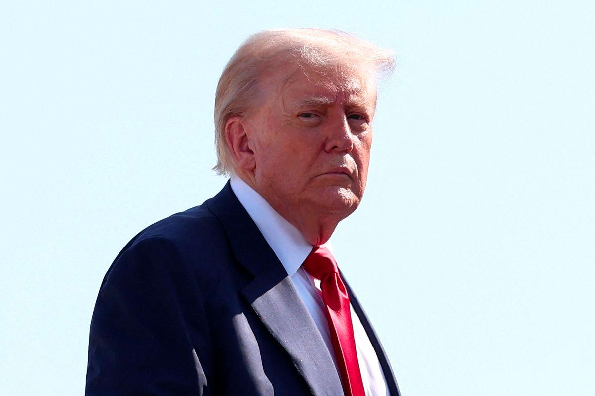 U.S. President Donald Trump boards Air Force One, as he departs for Scotland, at Joint Base Andrews, Maryland, U.S., July 25, 2025. - REUTERSPIX