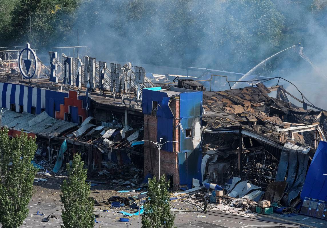 A firefighter works at the site of a household item shopping mall which was hit by a Russian missile strike, amid Russia's attack on Ukraine, in the city of Kamianske, Dnipro region, Ukraine July 26, 2025. - REUTERSPIX