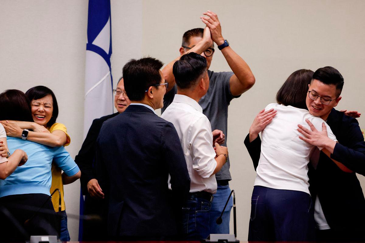 Kuomintang (KMT) lawmakers celebrate after the results of the recall election in Taipei ,Taiwan July 26, 2025 - REUTERSPIX