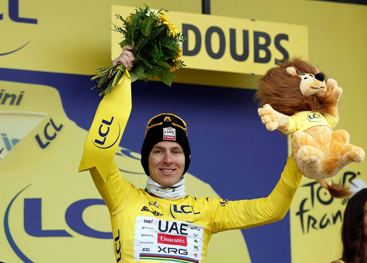 AE Team Emirates XRG’s Tadej Pogacar celebrates on the podium wearing the yellow jersey after stage 20 - REUTERS