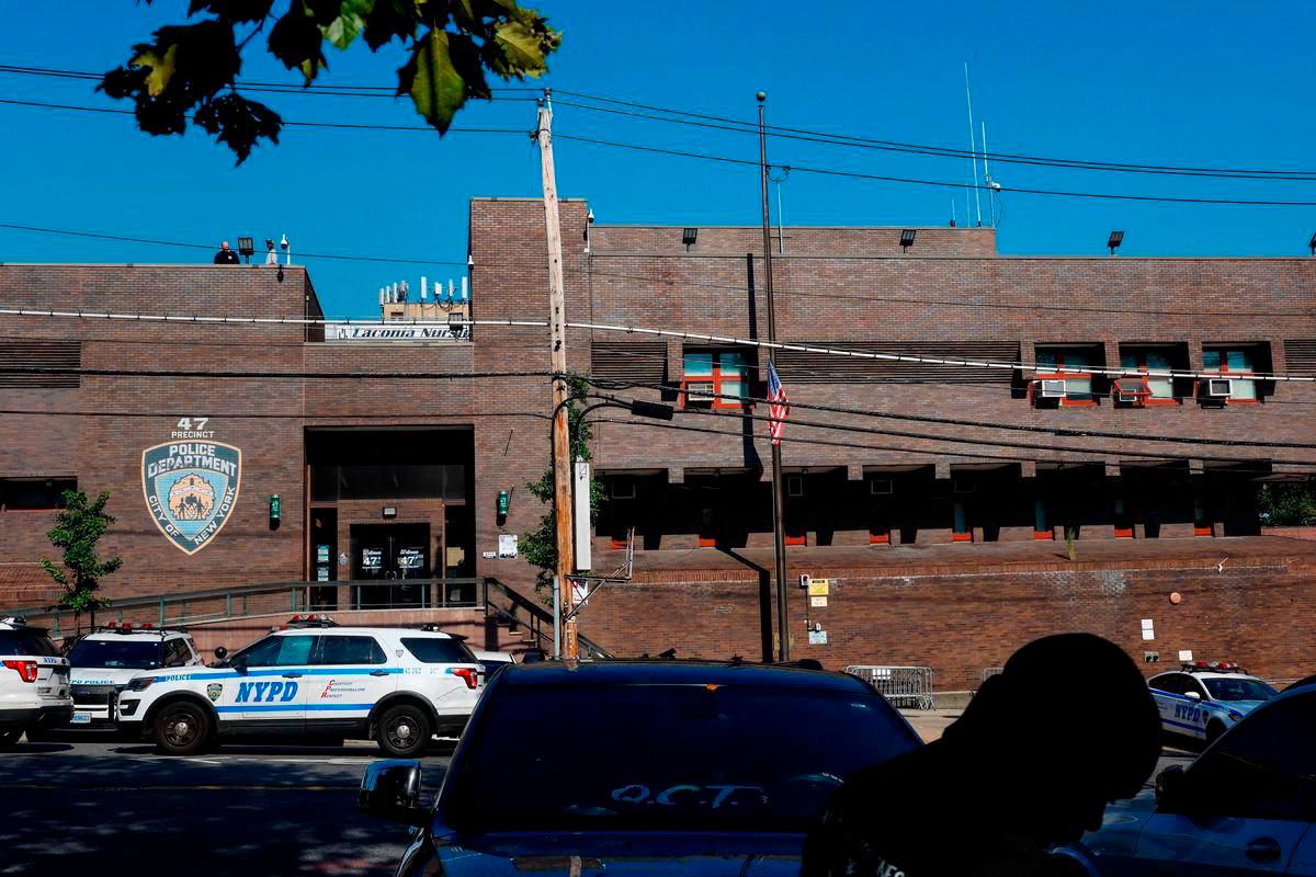 The U.S. flag hangs at half mast outside the 47th precinct, which was the police station for the New York Police Department’s Didarul Islam who was killed in the deadly mass shooting, outside the precinct in the Bronx borough of New York City - Reuterspix
