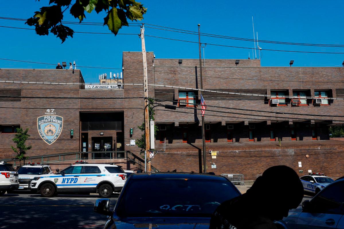 The U.S. flag hangs at half mast outside the 47th precinct, which was the police station for the New York Police Department’s Didarul Islam who was killed in the deadly mass shooting, outside the precinct in the Bronx borough of New York City - Reuterspix