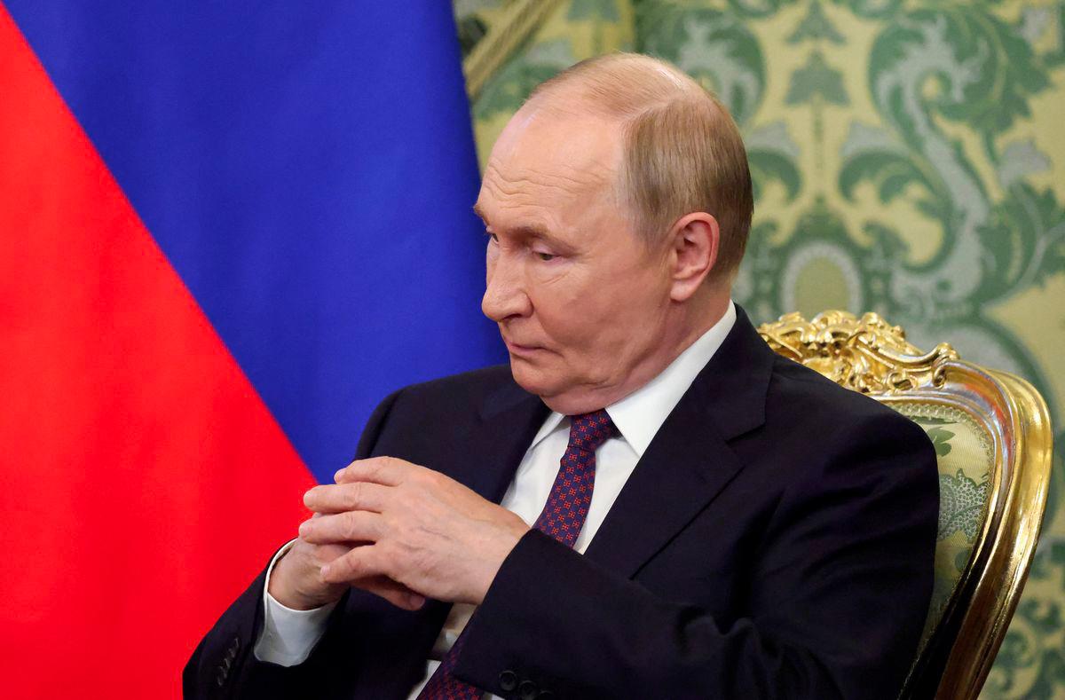 Russian President Vladimir Putin attends a meeting with Laotian President Thongloun Sisoulith at the Kremlin in Moscow, Russia, July 31, 2025. - REUTERSPIX