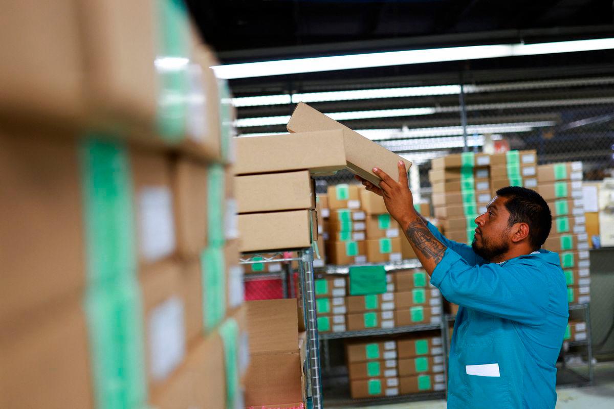 An employee works at an NPD Technology factory that assembles printed circuit boards (PCBs) for export to the United States, in Ciudad Juarez, Mexico, July 31, 2025- REUTERS