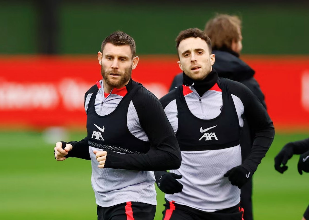 Soccer Football - Champions League - Liverpool Training - AXA Training Centre, Liverpool, Britain - February 20, 2023 Liverpool’s James Milner and Diogo Jota during training. - Action Images via REUTERS
